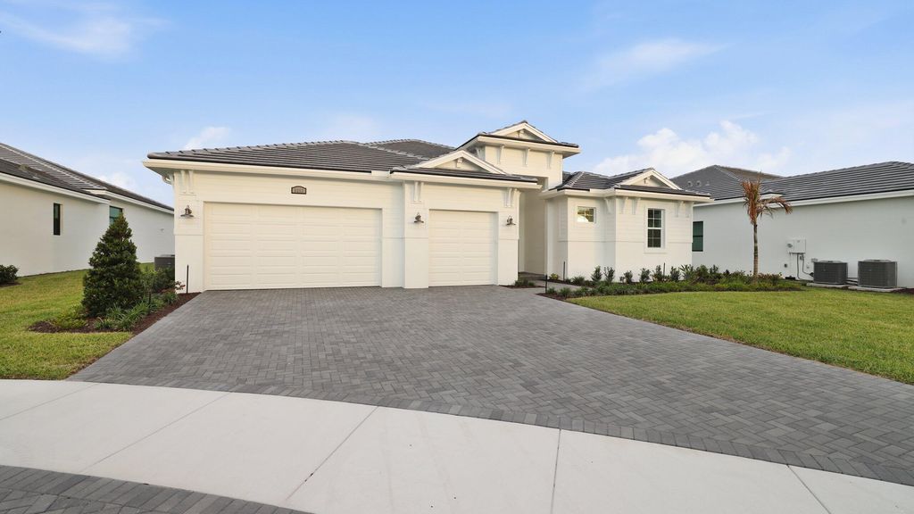 Photo of 8358 SW Puccini Way, Port Saint Lucie, FL 34987 (MLS # B26018388)