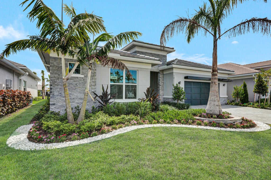 Photo of 10111 Timber Creek Way, Palm Beach Gardens, FL 33412 (MLS # R11113167)