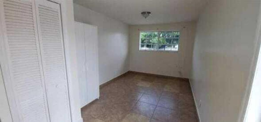 Cozy and well-maintained efficiency ready for move-in June 1, 2026! This bright unit features tile flooring throughout, updated bathroom, split A/C unit, refrigerator, and ample closet/storage space. Includes 1 assigned parking space. Rent is $1,100/month plus a flat $250 utility fee covering water, electricity, and internet. Conveniently located near shopping, dining, and major highways. Fast approval process. Ready to move in! Please send CTL along with paystubs, copy of ID, credit report, rental application and background check. Please TEXT Jessica for showing instructions. 954.821.7883