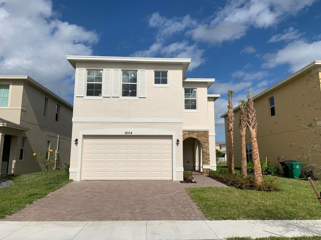 Photo of 1604 NW Cataluna Circle, Port Saint Lucie, FL 34986 (MLS # R10771480)