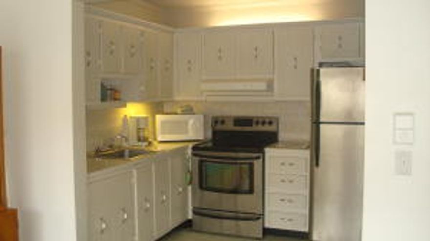 Nicely decorated, clean one bedroom.  Needs new floors.