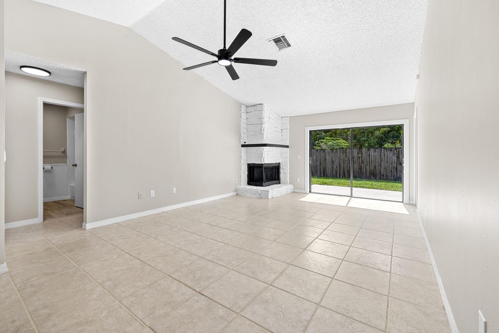 Photo of 1322 Denlow Lane, Royal Palm Beach, FL 33411 (MLS # B26050544)