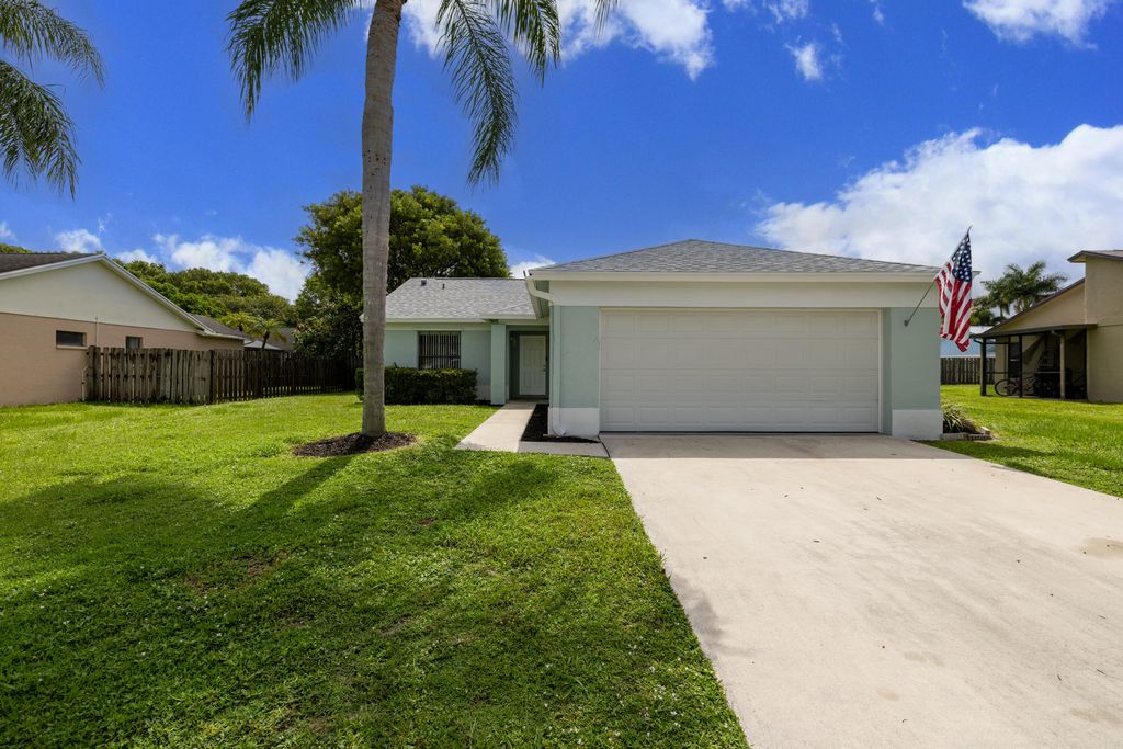 Photo of 1322 Denlow Lane, Royal Palm Beach, FL 33411 (MLS # B26050544)