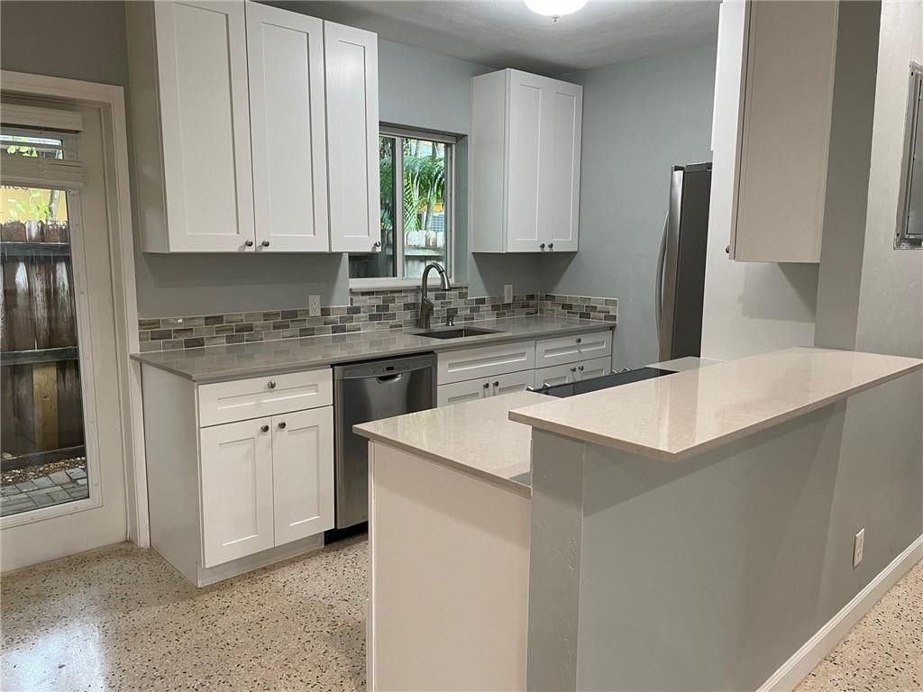 Photo of 1408 NE 4th Place, Fort Lauderdale, FL 33301 (MLS # B26025837)