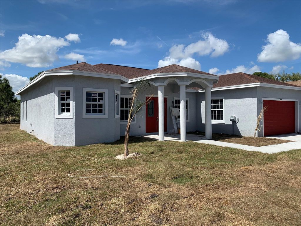 Photo of 5810 NW Coosa Drive, Port Saint Lucie, FL 34986 (MLS # F10549962)