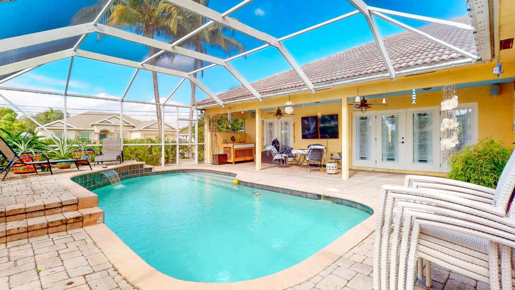 Photo of 1590 SW Underwood Avenue, Port Saint Lucie, FL 34953 (MLS # R10958140)