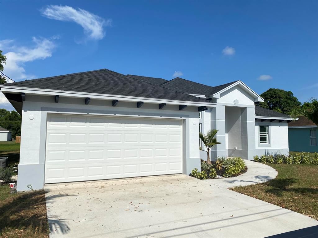 Photo of 2531 SE Rock Springs Drive Dr, Port St Lucie, FL 34952 (MLS # R10810217)