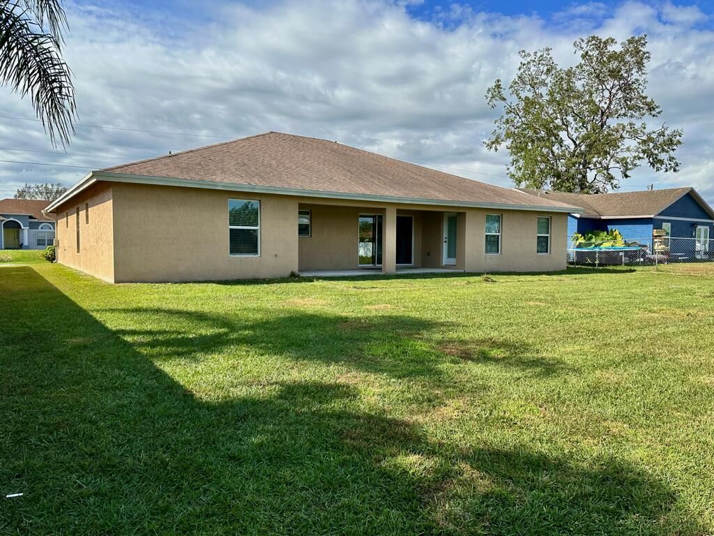 Photo of 4417 SW Baturro Street, Port Saint Lucie, FL 34953 (MLS # R10952439)