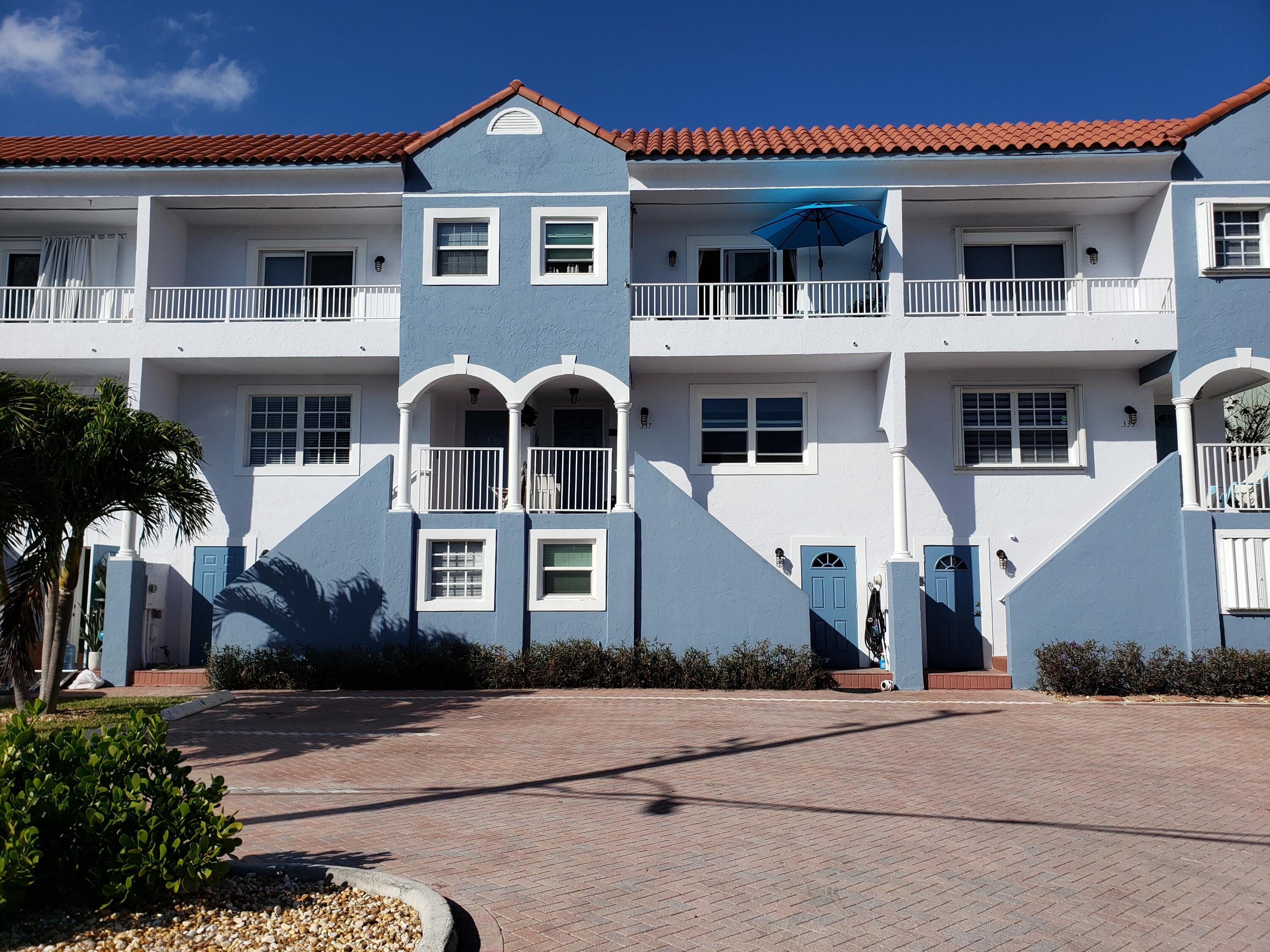 **WEEKLY RATES**2 WEEK MINIMUM**4 bed / 4 bath townhome with a coastal decor is the perfect retreat for your beach getaway. Less than a block to the Broadwalk and Hollywood Beach's pristine sand and water, this home has everything you need. The downstairs features the living room with a 50'' Smart HDTV, sofa, loveseat, kitchen, dining area and a remodeled bathroom. The kitchen has updated cabinets and granite counters. There is also a bar top that seats 3. Upstairs features a master bedroom with a queen sized bed, walk-in closet, bathroom with a shower / tub combo and dual sinks. Also upstairs is a guest bedroom with a full mattress, guest bathroom with a shower & an additional guest bedroom that has a queen sized bed. All bedrooms features TV's. Ground level is a 1/1 with kitchenette