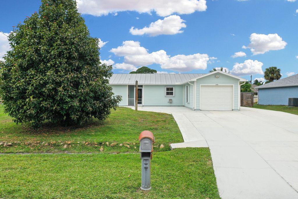 Photo of 2486 SW Waikiki Street, Port Saint Lucie, FL 34953 (MLS # R11148734)
