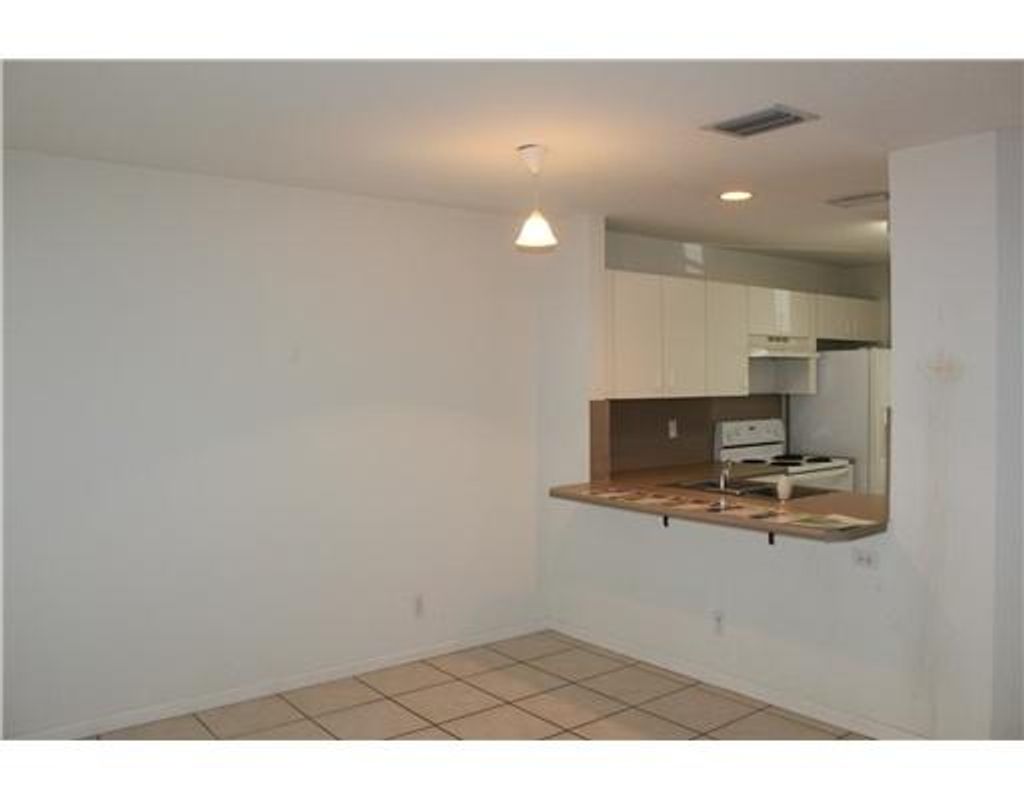 Photo of 844 Summit Lake Drive, West Palm Beach, FL 33406 (MLS # R10938943)