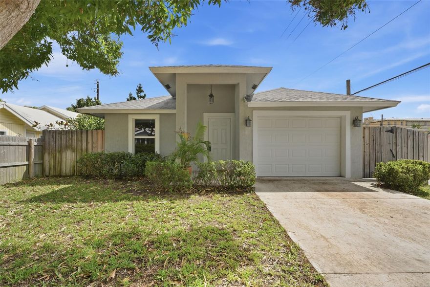 Well-maintained 3-bedroom, 2-bathroom home built in 2020 with impact windows, located in Lake Worth Beach. This home offers a functional layout with comfortable living and dining areas and a practical kitchen with plenty of storage. The primary bedroom includes a private bathroom, and the two additional bedrooms are ideal for family, guests, or a home office. A 1-car garage provides secure parking and extra storage space. No HOA and less than a 10 minute drive to the beach!The property also features a yard with room to enjoy the outdoors. Conveniently located near Downtown with shopping, dining, and local beaches, this home is a great option for full-time living or investment. Please use showing time for all showings.Open House Saturday March 7 12:00-2:00 and Sunday March 8  12:00-2:00