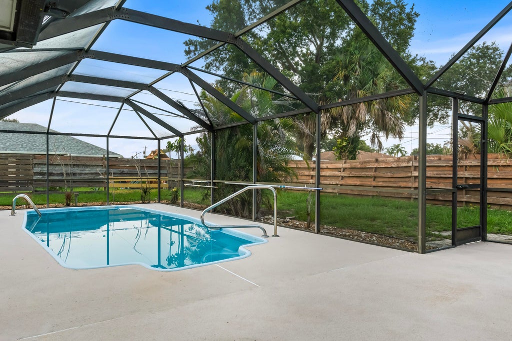 Photo of 1167 SW GARDENA Avenue, Port Saint Lucie, FL 34953 (MLS # B26066849)