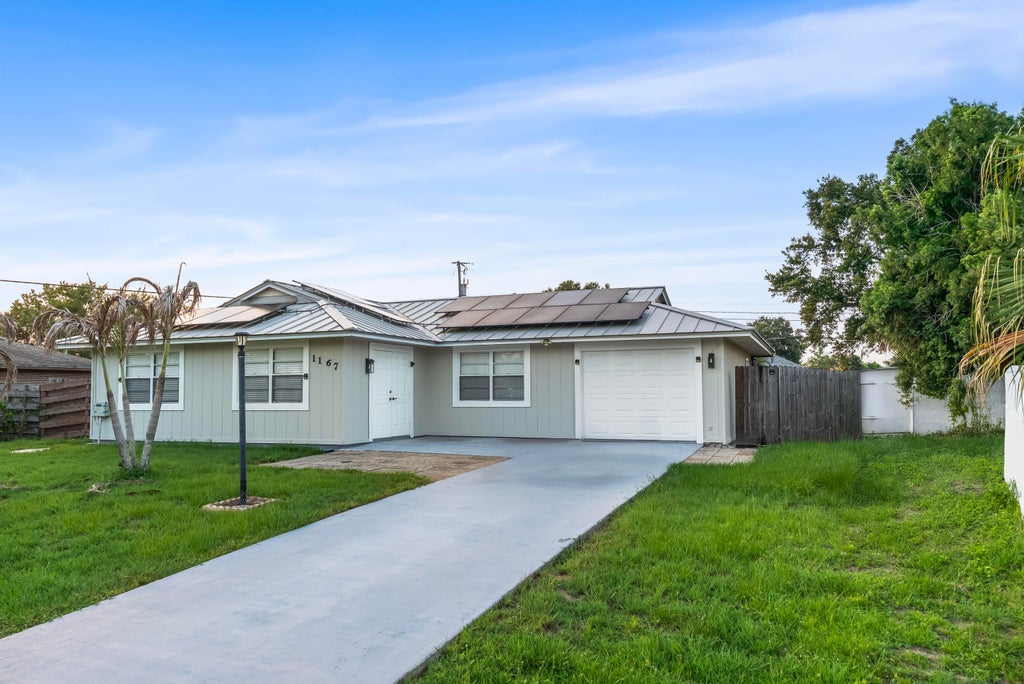 Photo of 1167 SW GARDENA Avenue, Port Saint Lucie, FL 34953 (MLS # B26066849)