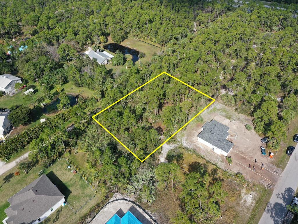 Build Your Dream Home on a .63 Acre Triple Lot in the Highly Desirable Neighborhood of Pine Lake Estates! NoHOA!