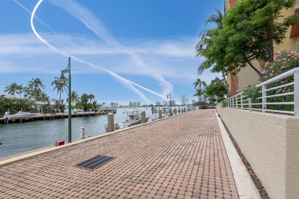 Photo of 2650 LAKE SHORE Drive #101, Riviera Beach, FL 33404 (MLS # B26080223)
