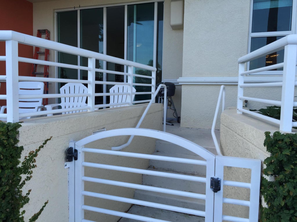 Photo of 2650 LAKE SHORE Drive #101, Riviera Beach, FL 33404 (MLS # B26080223)