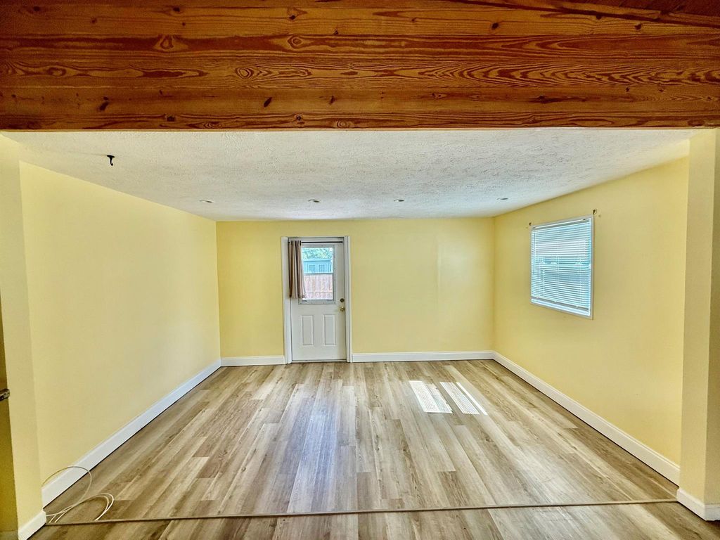 Photo of 1401 NE Elizabeth Avenue, Jensen Beach, FL 34957 (MLS # R11143745)