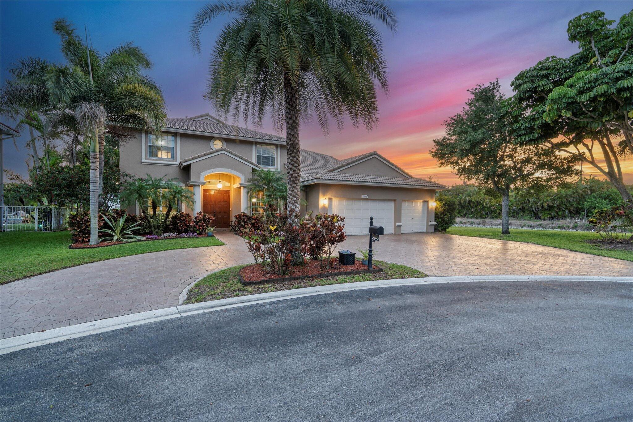 Welcome to this exceptional 5-bedroom, 3-bath single-family home nestled in the sought-after Grand Reserve subdivision of Coral Springs. Offering 3,137 square feet of well-designed living space, this residence sits on a private cul-de-sac with water views on two sides, creating a serene and private setting. The open floor plan features expansive living areas, ideal for both relaxing and entertaining. A newly upgraded kitchen with premium appliances enhances both style and functionality, making meal prep a pleasure. The spacious primary suite boasts a large private balcony with tranquil waterfront views and a luxurious hot tub--perfect for unwinding in comfort.