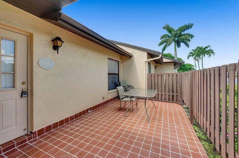 Photo of 807 Sky Pine Way #F, Greenacres, FL 33415 (MLS # R11034380)