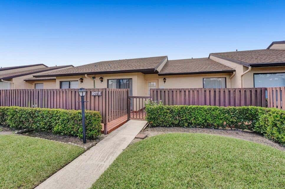 Photo of 807 Sky Pine Way #F, Greenacres, FL 33415 (MLS # R11034380)