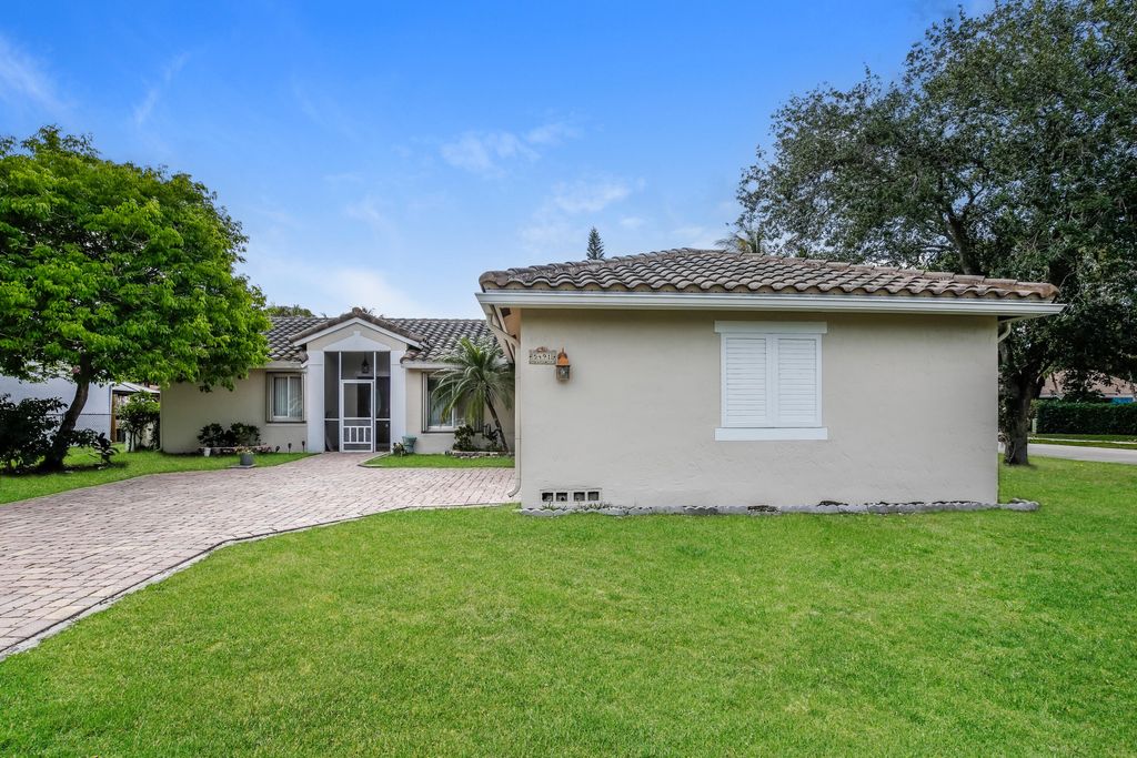 Photo of 5491 NW 40th Terrace, Coconut Creek, FL 33073 (MLS # B26016967)