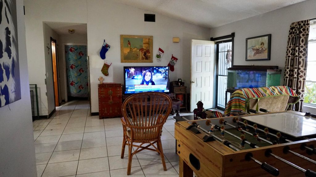 Photo of 933 SW Liberty Avenue, Port Saint Lucie, FL 34953 (MLS # R10963982)