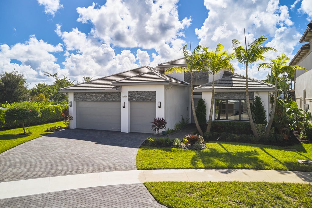 Photo of 12854 Soaring View, Palm Beach Gardens, FL 33412 (MLS # B26094207)