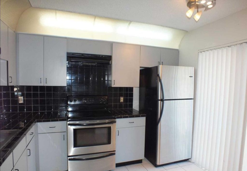 Photo of 300 E Club Circle #201, Boca Raton, FL 33487 (MLS # R11167844)