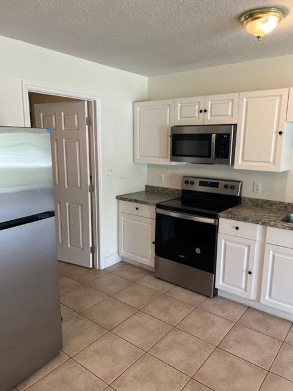 Photo of 5112 La Salle Street #A, Fort Pierce, FL 34951 (MLS # R10915802)