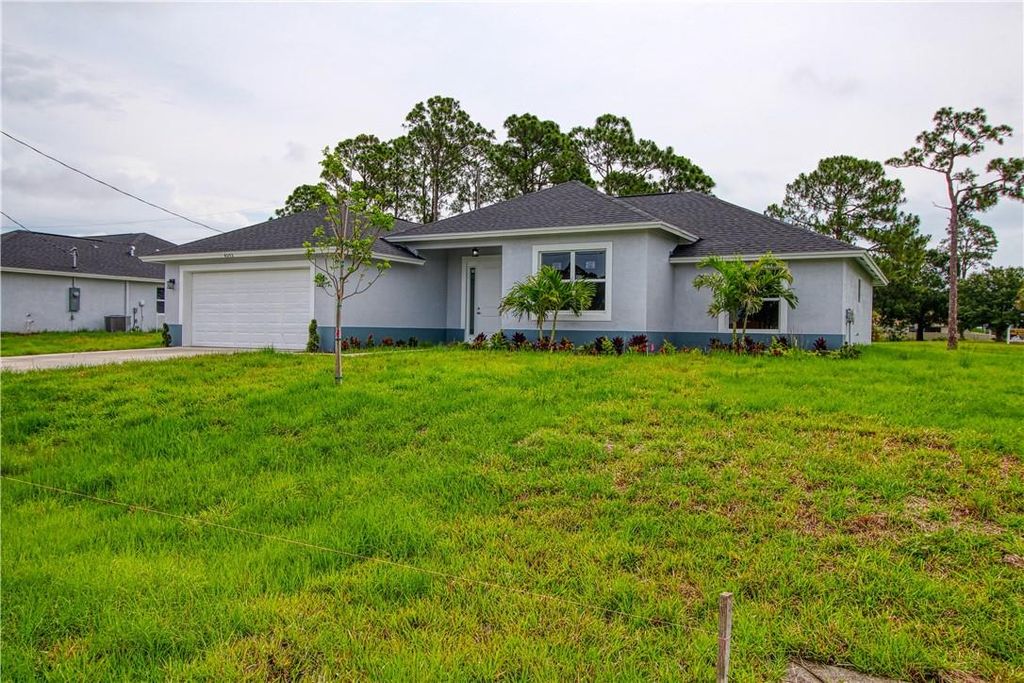 Photo of 4593 SW Bradbury St, Port St Lucie, FL 34953 (MLS # F10382182)