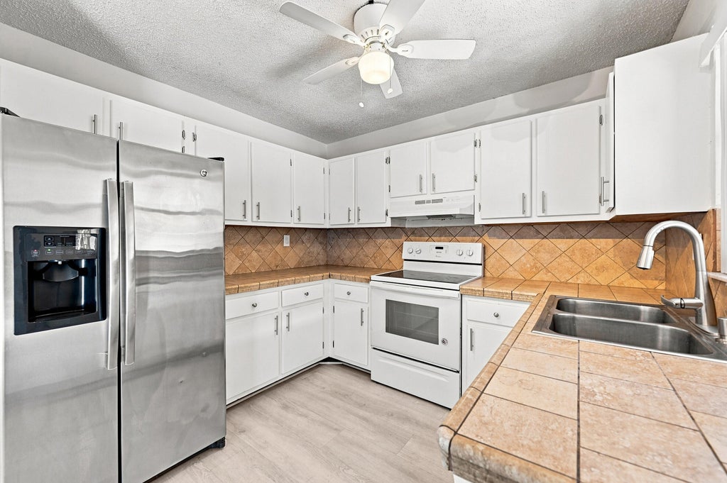 Photo of 4408 NW 4TH Avenue, Deerfield Beach, FL 33064 (MLS # B26061890)