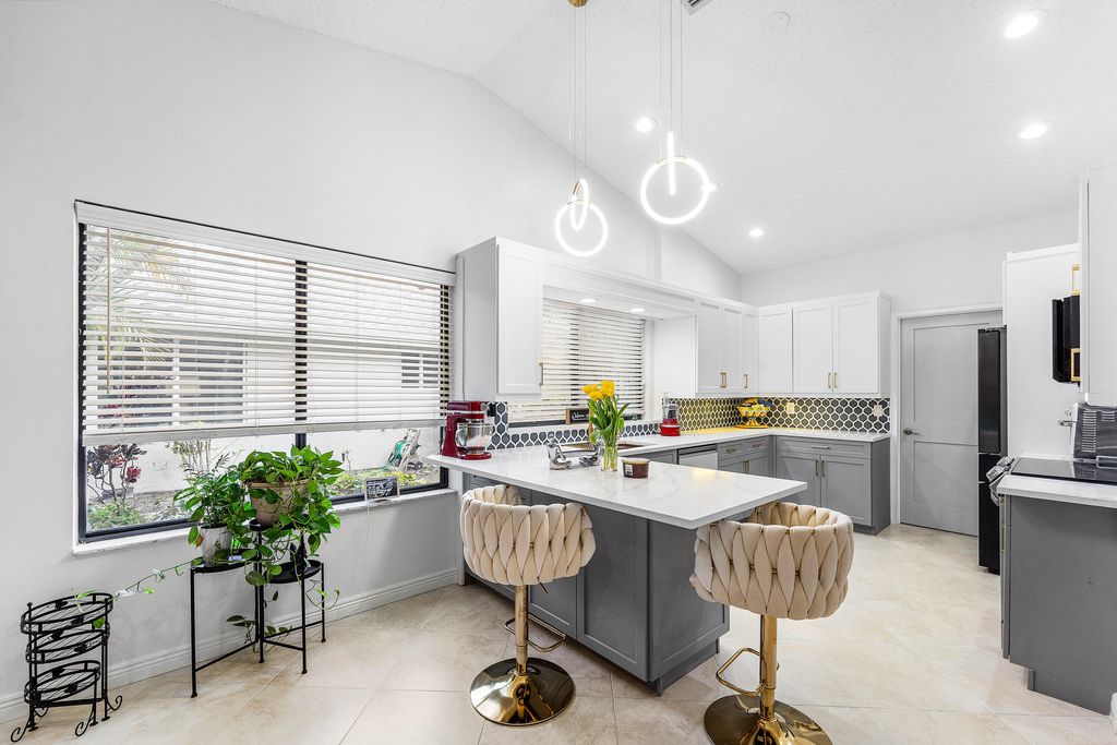 Photo of 1370 NW 28th Avenue, Delray Beach, FL 33445 (MLS # R11144566)