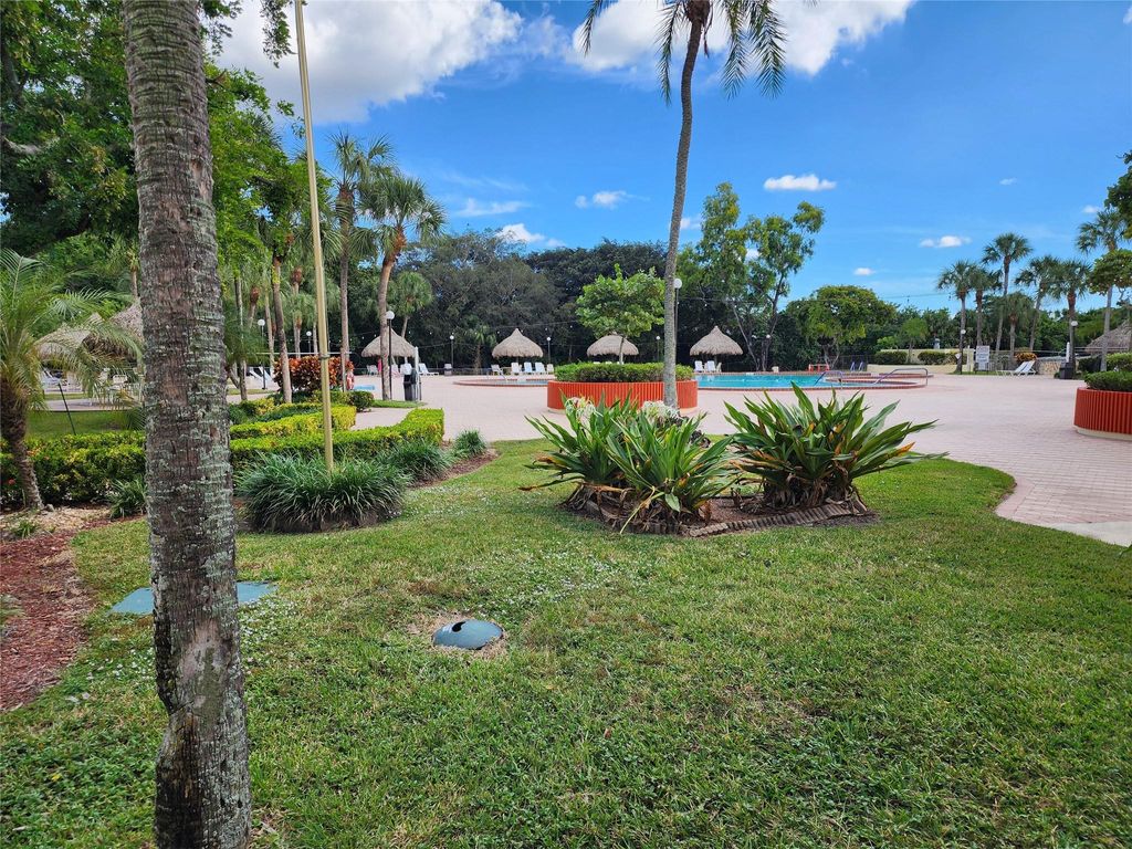 Photo of 3050 Holiday Springs Blvd #207, Margate, FL 33063 (MLS # F10538449)