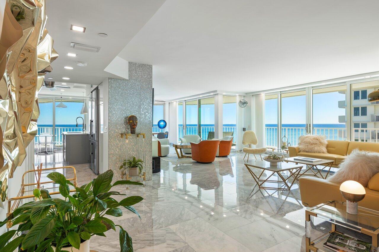 OCEAN OCEAN OCEAN!! Every room has an ocean view! Experience luxury coastal living in this stunning 3 BD/4 BA condo with Carrara marble floors, floor-to-ceiling impact windows, and panoramic ocean views from every bedroom in addition to the wrap-around balcony. Modern finishes, including a custom contemporary kitchen with a wine fridge and two side by side Liebherr refrigerator/freezer, elevate the living space. Rarely found, 4 fully renovated, spa-like bathroom suites. Private beach access, an oceanfront resort-style pool and deck, and an amazing club room, offering the perfect blend of elegance and convenience. This property also includes two garage spaces and a large storage unit for added convenience.
