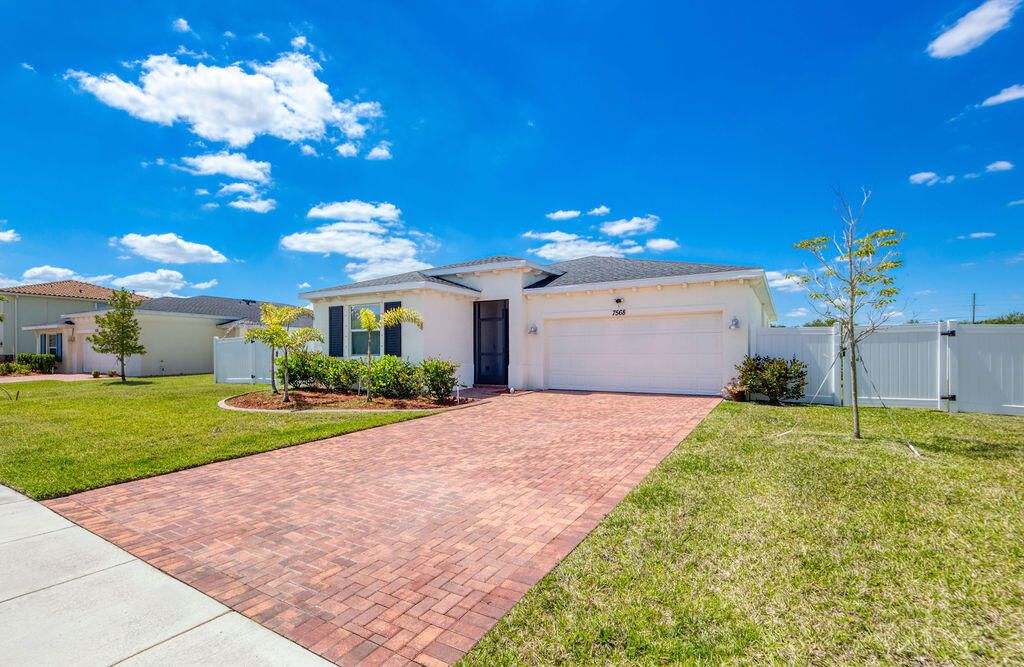 Photo of 7568 NW Deysbrook Lane, Port Saint Lucie, FL 34987 (MLS # R11085191)