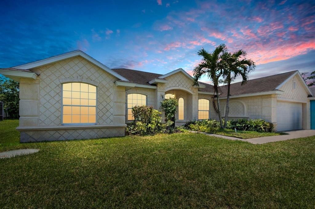 Photo of 1014 SW Placetas Avenue, Port St Lucie, FL 34953 (MLS # R10889926)