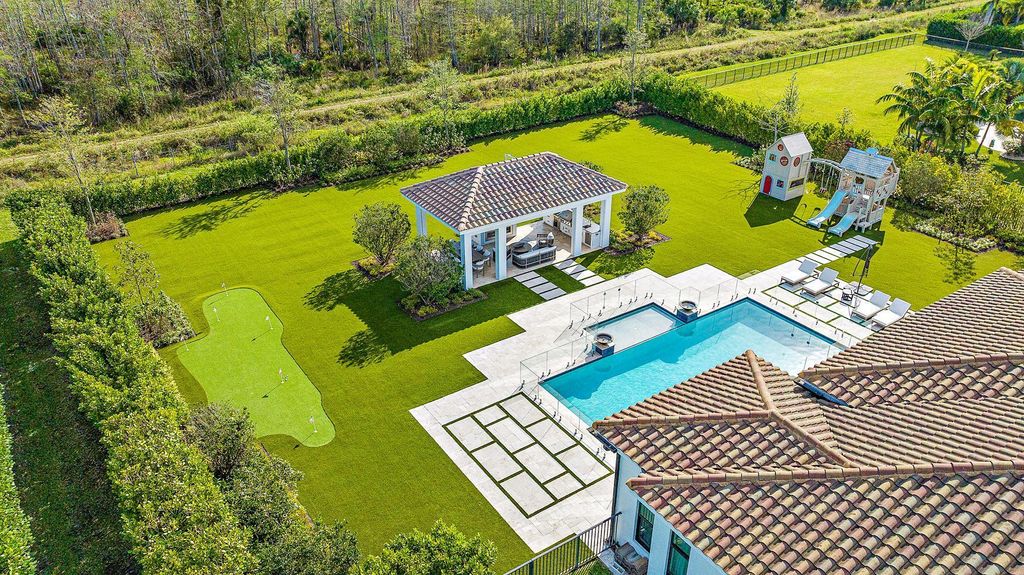 Photo of 7952 SE Old Plantation Circle, Jupiter, FL 33458 (MLS # R10969151)