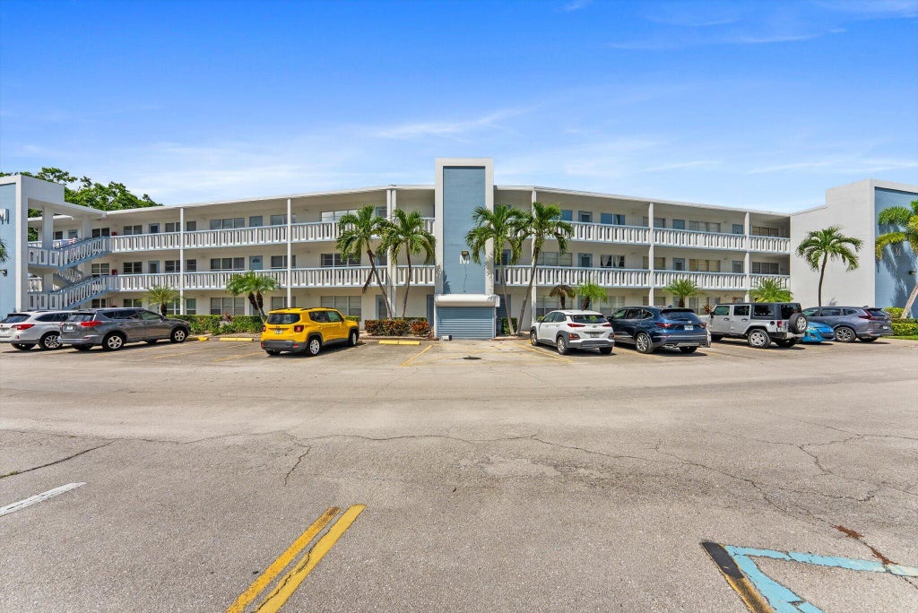 Photo of 309 WELLINGTON M, West Palm Beach, FL 33417 (MLS # B26074110)