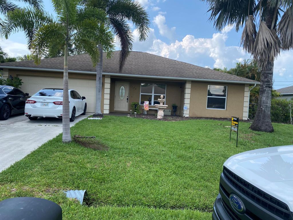 Photo of 1129 SW John Maccormack Terrace SW, Port St Lucie, FL 34953 (MLS # R10898657)
