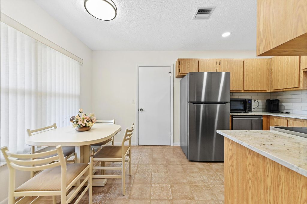 Photo of 8515 Lake Point Court, Lake Worth, FL 33467 (MLS # B26026531)