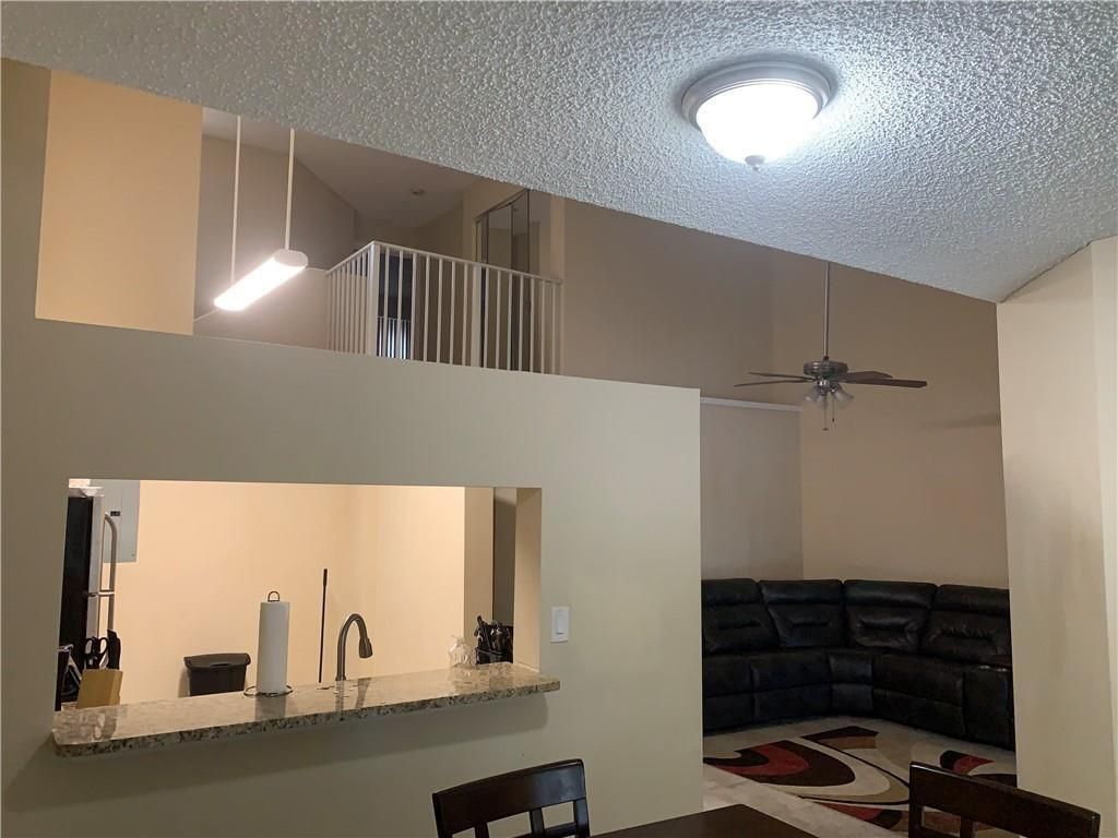 Photo of 858 NW 92nd Avenue #858, Plantation, FL 33324 (MLS # B26012832)