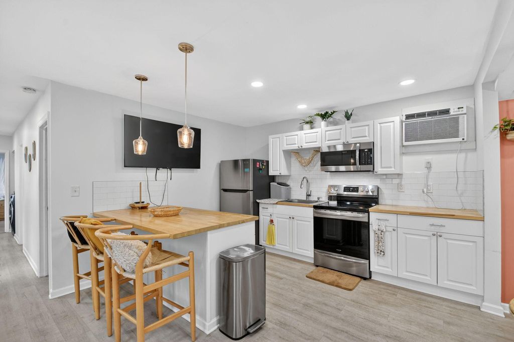 Photo of 306 N J Street, Lake Worth Beach, FL 33460 (MLS # B26015897)