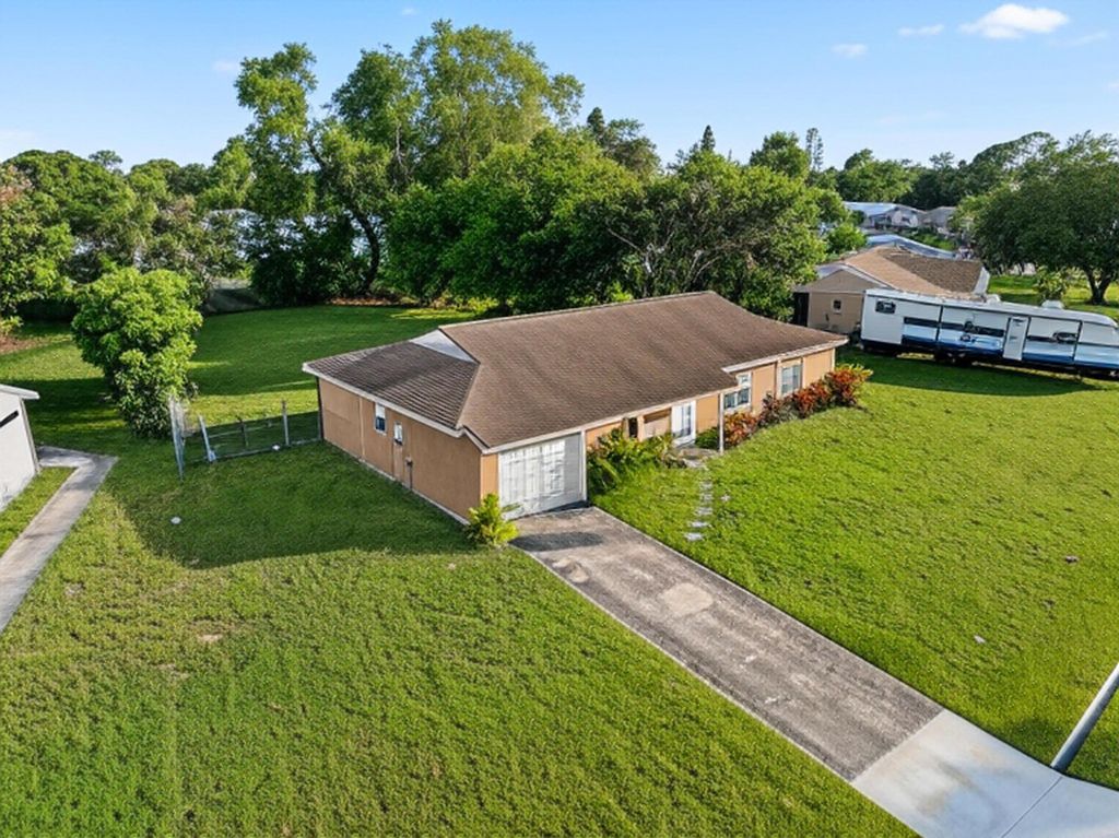 Photo of 226 SW Kimball Circle, Port Saint Lucie, FL 34953 (MLS # R11118739)