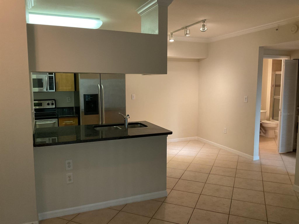 Photo of 6565 Emerald Dunes Drive #306, West Palm Beach, FL 33411 (MLS # R11015648)