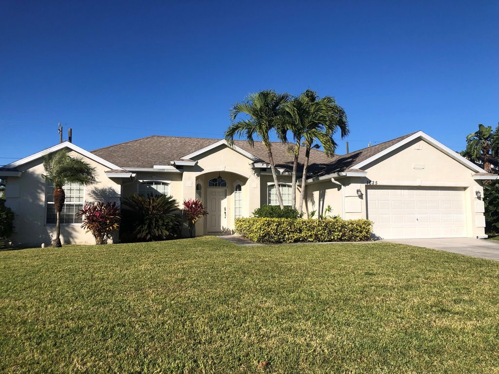 Photo of 1625 SW Merchant Lane, Port St Lucie, FL 34953 (MLS # R10860937)