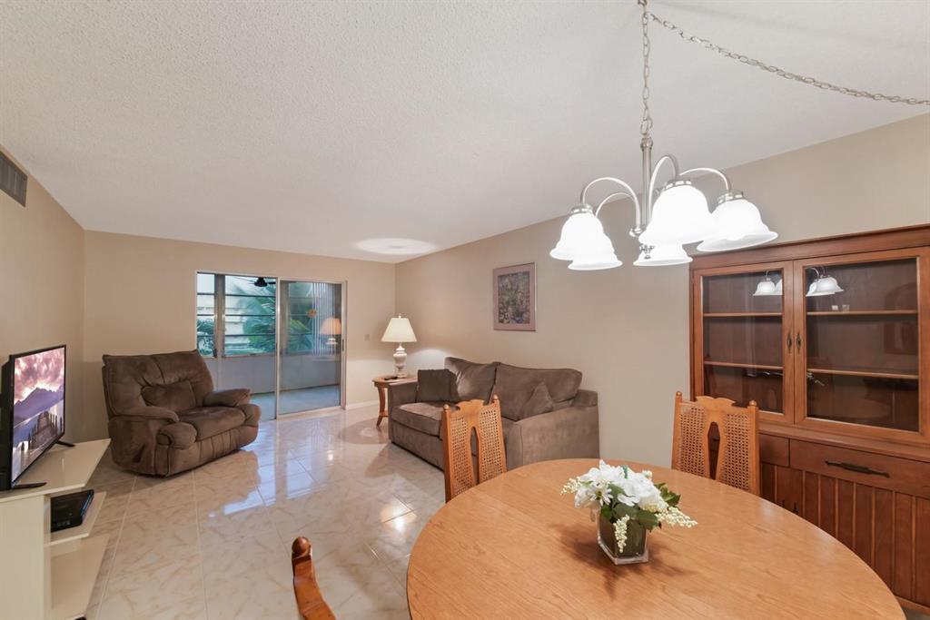 Enjoy this lovely, furnished, 1 bedroom, 1.5 bathroom condo located in Village Royale. This spacious floor plan includes: eat in kitchen, dining room, living room and plenty of storage. The eat-in kitchen provides newer appliances and plenty of cabinet and counterspace. Spacious master retreat with his and hers closets and an en-suite bath. Relax on your enclosed patio with a garden view. This socially active community offers: a newly renovated clubhouse, fitness center, theater, card room, billiards, 2 heated pools, tennis, pickleball, bocce and shuffleboard. Numerous clubs and activities to keep you entertained. Located close to shopping, dining, entertainment, major highways, airports and the beach.