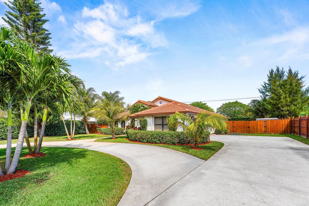 Photo of 3897 Sherwood Boulevard, Delray Beach, FL 33445 (MLS # B26002370)