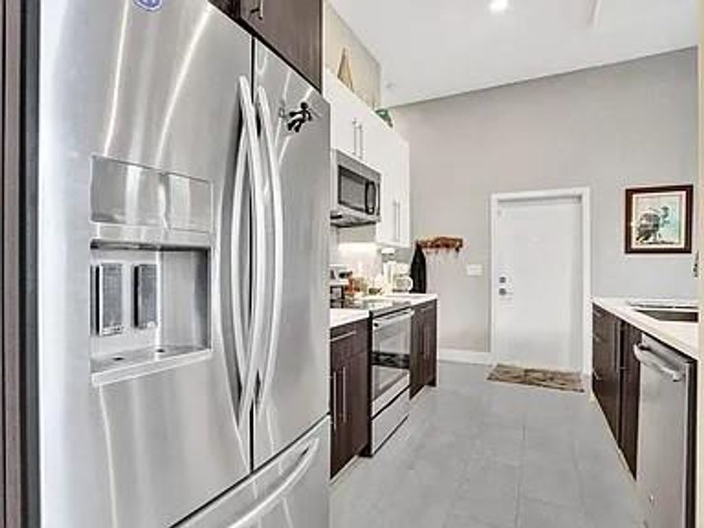 Photo of 901 NW 45th Terrace #1, Plantation, FL 33317 (MLS # F10466432)