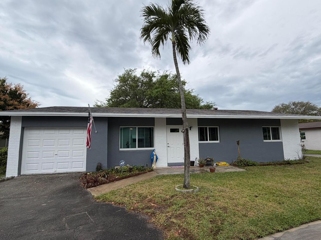 Photo of 2615 SW Natura Avenue, Deerfield Beach, FL 33441 (MLS # B26002446)